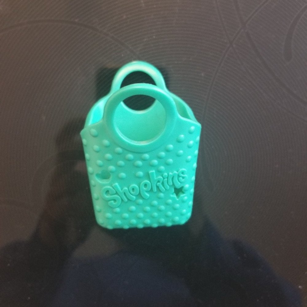 Child's Shopkins teal green shopping basket